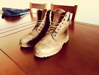 High angle view of shoes on hardwood floor