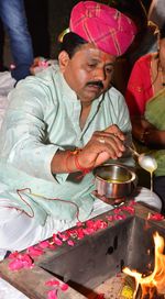 Midsection of a man preparing food
