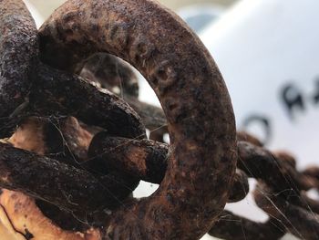 Close-up of rusty wheel in winter