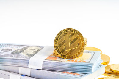 Close-up of coins on white background