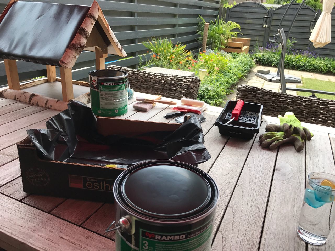 table, potted plant, high angle view, day, front or back yard, growth, wood - material, no people, outdoors, chair, plant, greenhouse, close-up, freshness