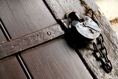 Close-up of padlock on door