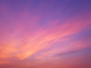 Low angle view of dramatic sky during sunset