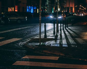 Traffic on city street at night