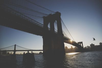 Silhouette of suspension bridge