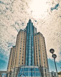 Low angle view of modern buildings against sky