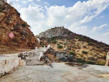 Panoramic view of rocks and mountains against sky