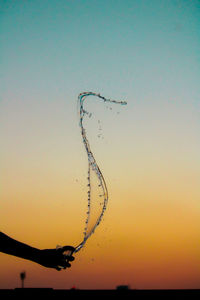 Low angle view of silhouette bare tree against sky during sunset