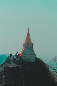 Low angle view of temple building against clear sky