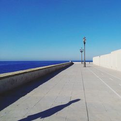 View of pier against blue sky