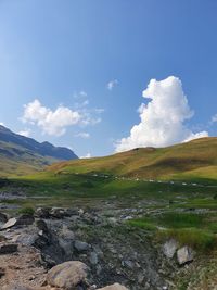 Low angle view of rock formations against sky