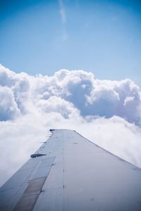Low angle view of airplane flying in sky