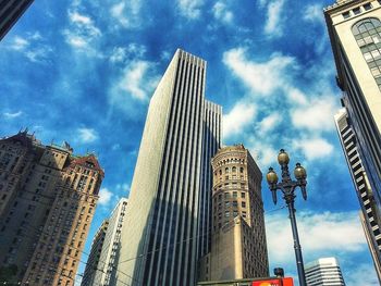 Low angle view of skyscrapers against sky