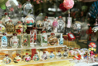 Collection of decorative, painted glass bottles for sale at a store in chinatown, san francisco 