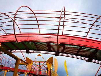 Low angle view of ferris wheel against sky