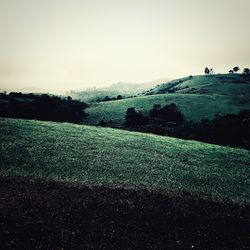 Scenic view of land against clear sky