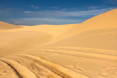 Scenic view of desert against sky