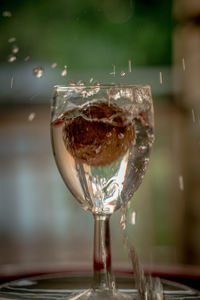 Close-up of wine glass on table