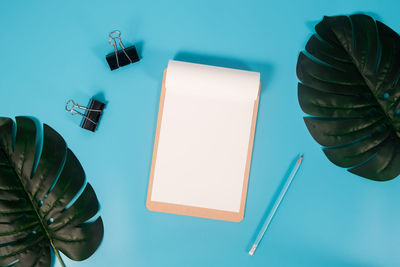 High angle view of open book on table