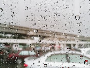 Full frame shot of raindrops on window