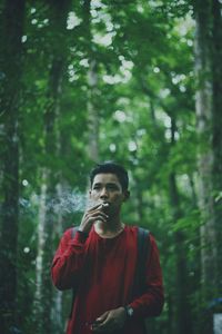 Portrait of woman in forest