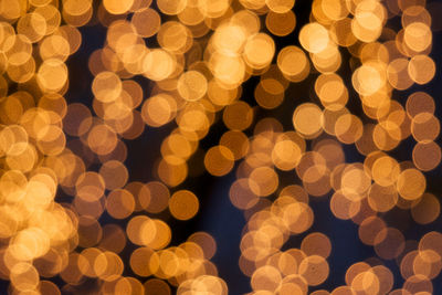 Defocused image of illuminated christmas lights