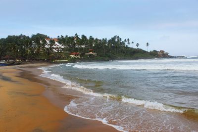 Scenic view of beach against sky