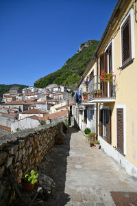 A narrow street of castelsaraceno, old village of basilicata region, italy.