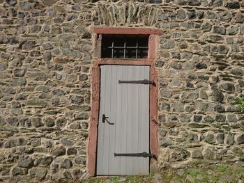 Close-up of window on brick wall