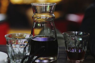 Close-up of wine glass on table