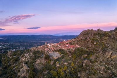 Drone aerial panorama view of monsanto historic village at sunset, in portugal