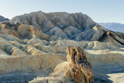 Scenic view of rock formations against sky