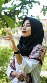 Young woman looking at camera