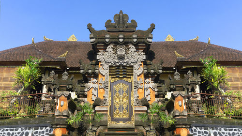 Exterior of temple against clear sky