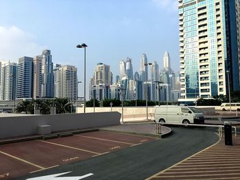 Modern buildings in city against sky