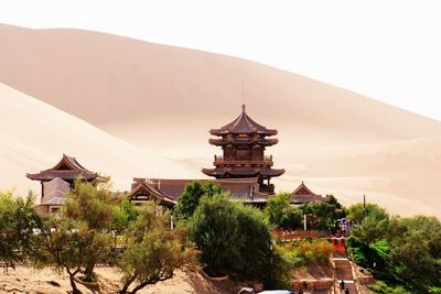 Landscape of temple building against sky