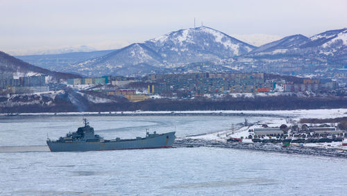 Military transport ship near the shore in winter on the kamchatka peninsula