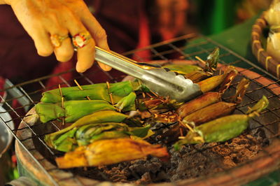 Close-up of person preparing food