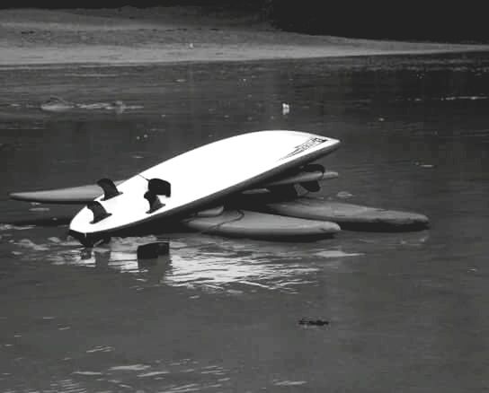 MAN IN BOAT AT LAKE