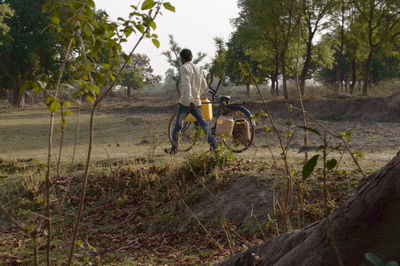 Bicycles riding bicycle on field