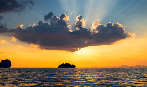 Scenic view of sea against sky during sunset