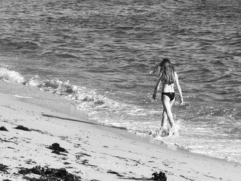 Full length of woman on beach