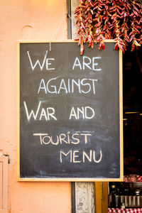 Close-up of text on wall
