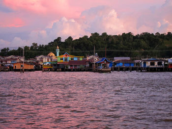 Scenic view of lake against sky during sunset