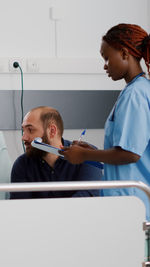 Doctor examining patient