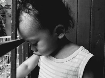 Close-up portrait of boy looking away