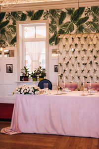 Potted plants on table at home