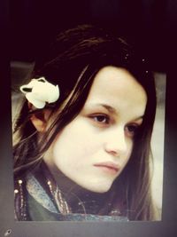 Close-up portrait of young woman