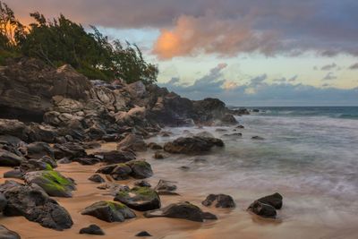 Scenic view of sea against sky at sunset