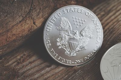 Close-up of coins on table